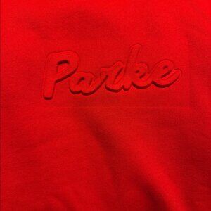 Parke Embossed Ruby Mock neck L/XL (brand new; never worn)